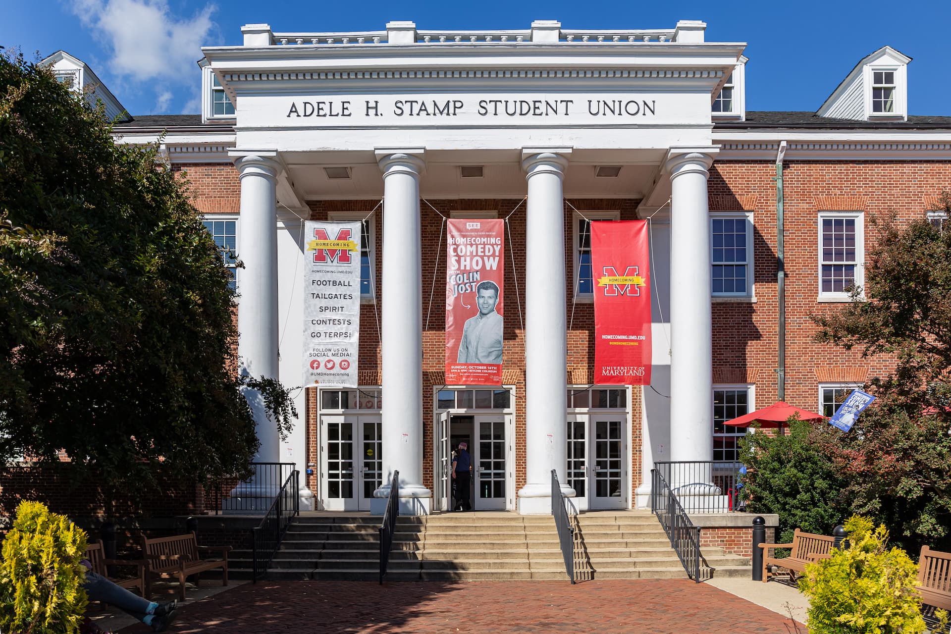 The exterior of Stamp Student Union with Homecoming banners hung outside the building.