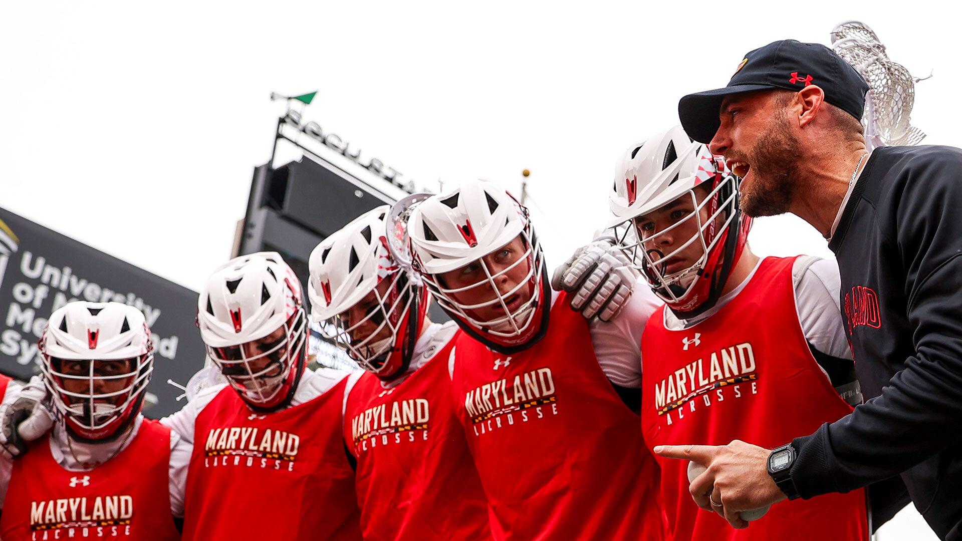 coach talks to Maryland men's lacrosse team