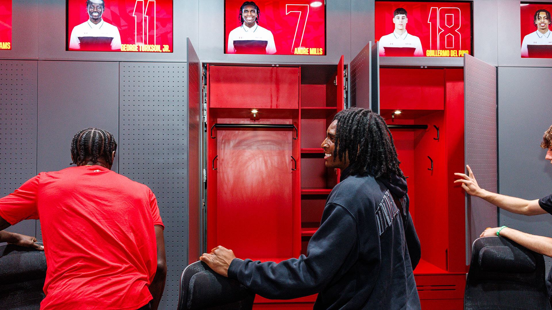 Andre Mills sees his new locker.