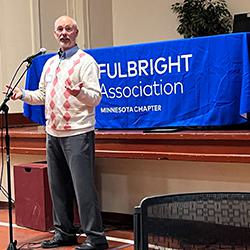 Michael Dorsher Ph.D. ’99 at microphone
