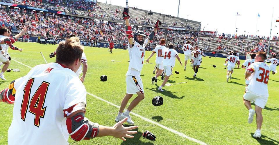 men's lacrosse team celebrates