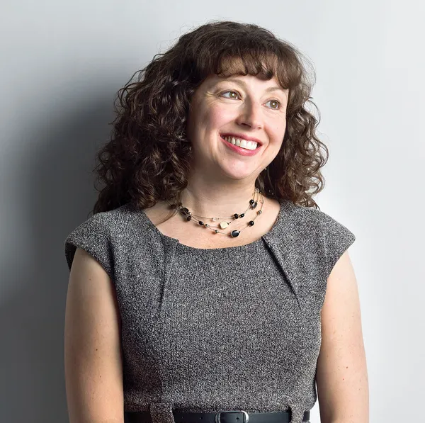 Lauren Brown portrait smiling, looking away