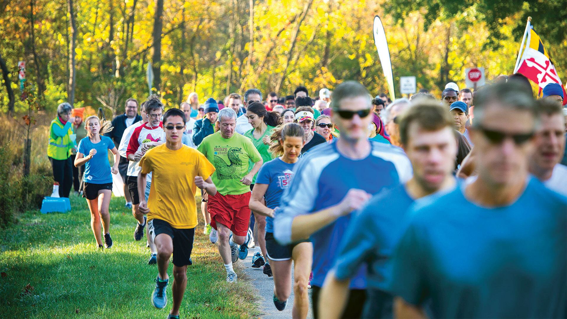group runs along trail