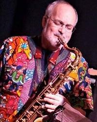 Richard “Richie” Reiter plays saxophone