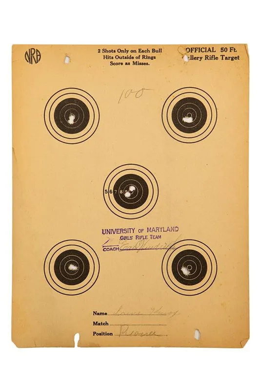 paper target with bullet holes