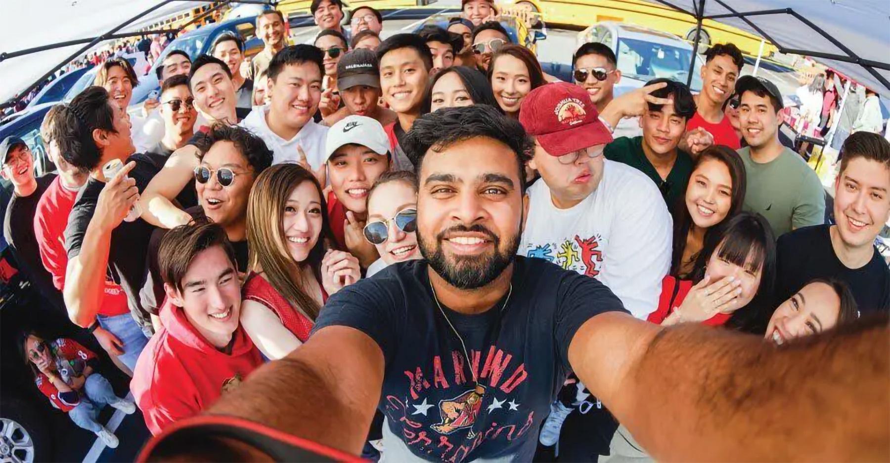 Large group of young people taking a selfie