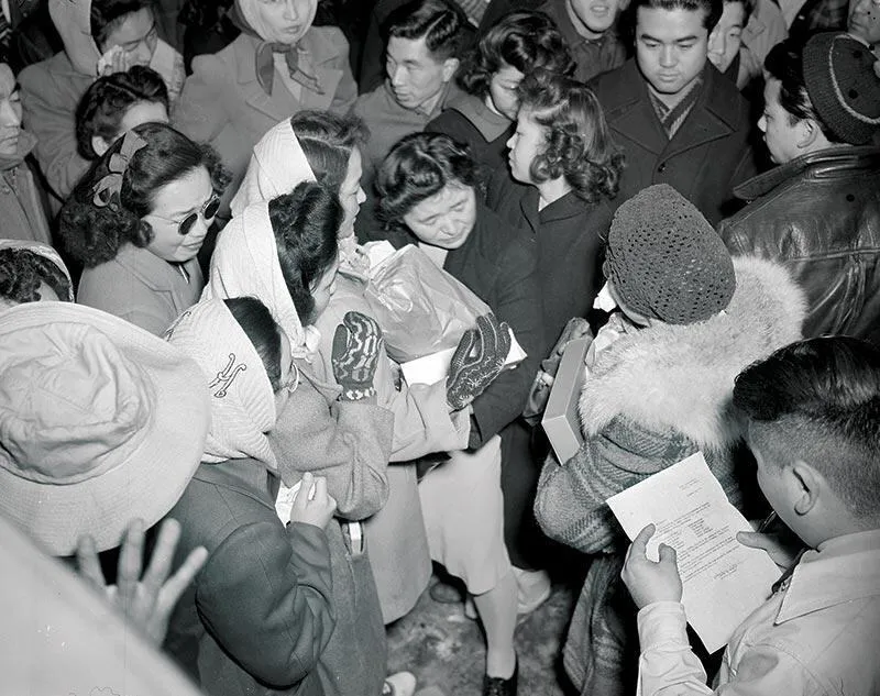 Prisoners in the Tule Lake Relocation Center in California say goodbye to people being transferred and granted leave.