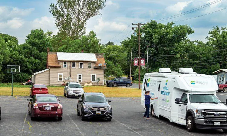mobile treatment unit in parking lot