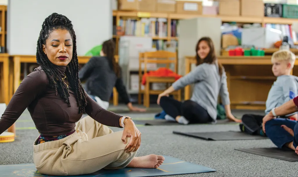 instructor leads yoga session