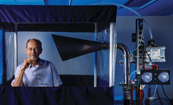 Don Milton poses with Gesundheit II machine
