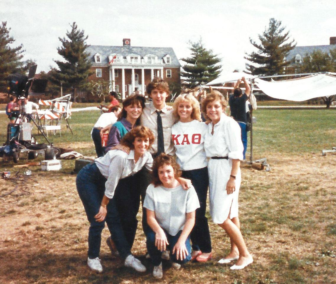 Kappa Alpha Theta sisters pose for a photo with Andrew McCarthy on Frat Row
