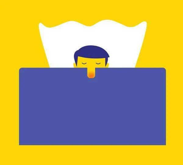 man in bed that looks like tissue box