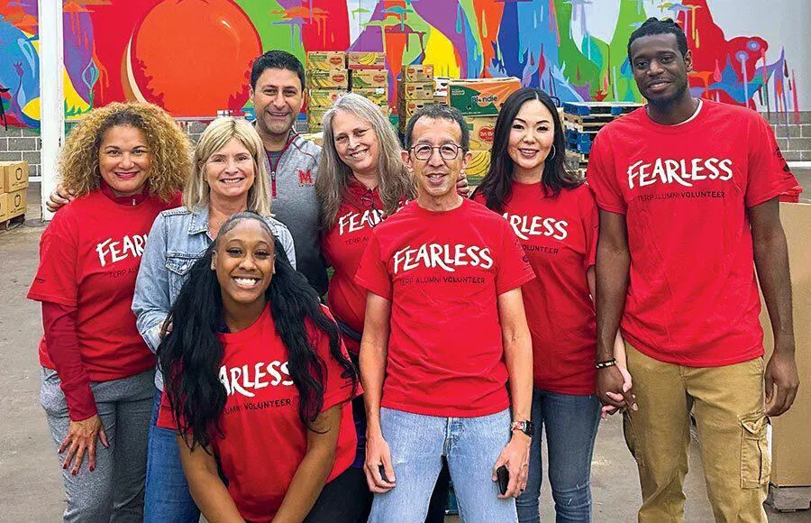 group wears red "Fearless" shirts