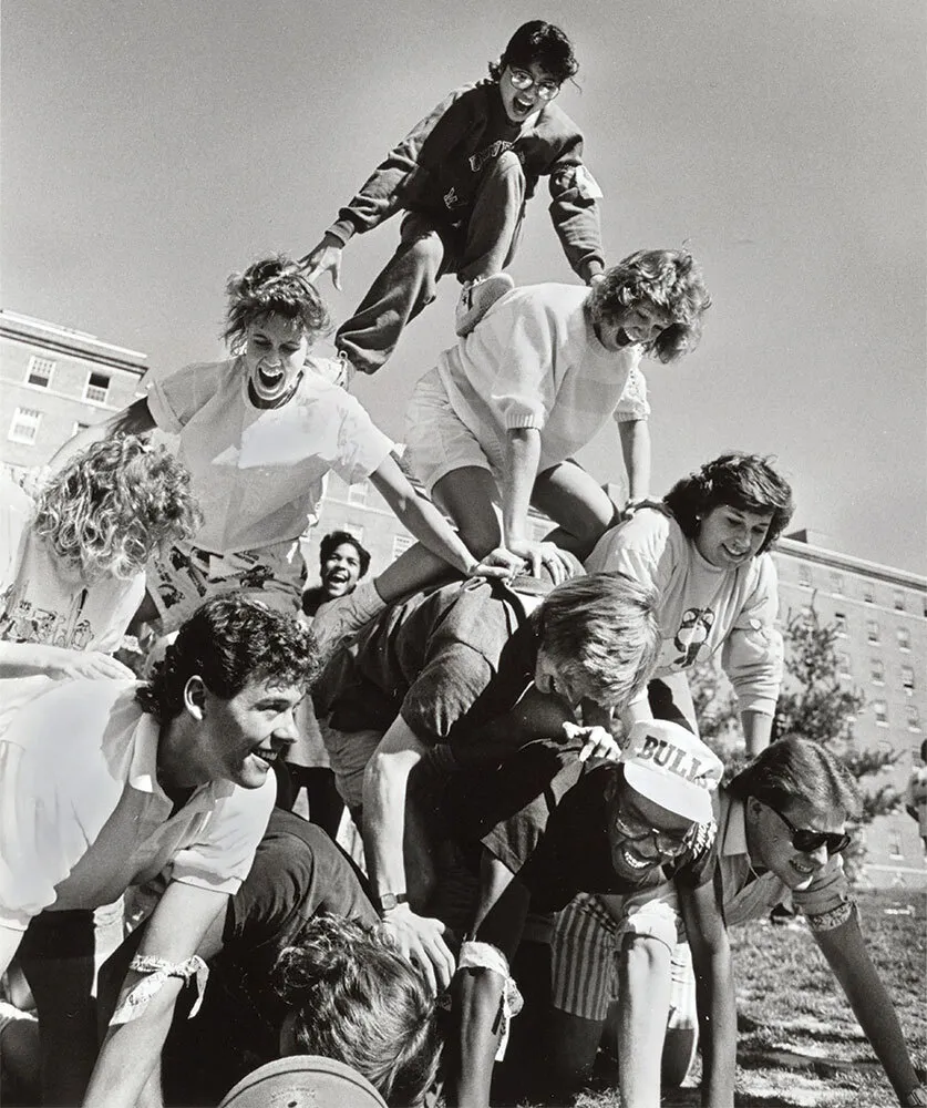 students form pyramid