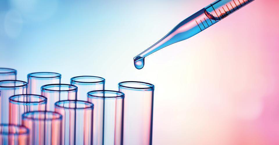 liquid dropping into test tubes